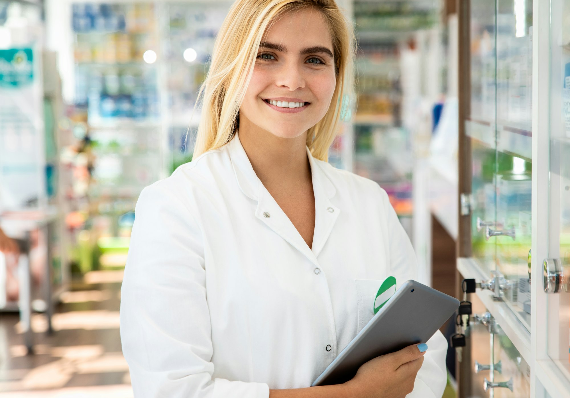 Portrait of female pharmacist in drugstore.